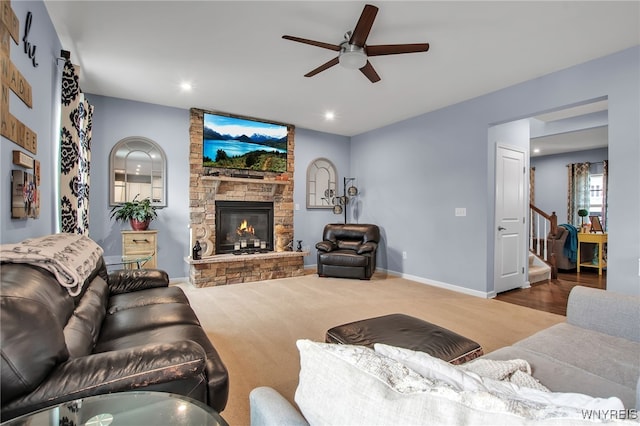 123 Stonebridge Rd, Grand Island, NY 14072 - living room featuring a ceiling fan, a stone fireplace, stairway, baseboards, and recessed lighting