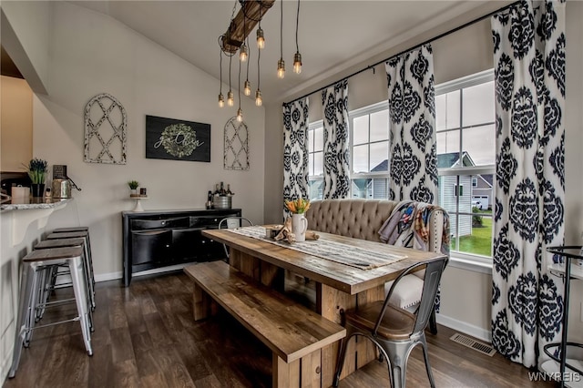 123 Stonebridge Rd, Grand Island, NY 14072 - dining space with dark wood-style floors, baseboards, and lofted ceiling