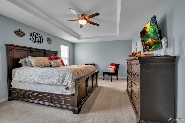 123 Stonebridge Rd, Grand Island, NY 14072 - bedroom with a tray ceiling, baseboards, light colored carpet, and a ceiling fan