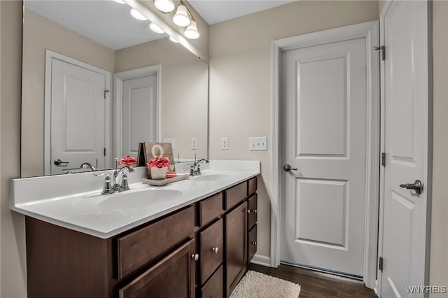 123 Stonebridge Rd, Grand Island, NY 14072 - full bath with double vanity, wood finished floors, and baseboards