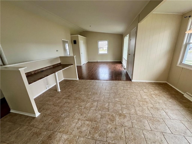 137 Matthew Cir, Horseheads, NY 14845 - unfurnished room with lofted ceiling and baseboards