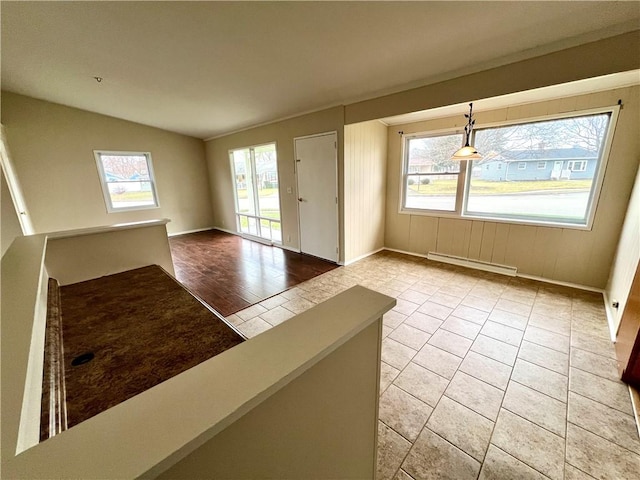 137 Matthew Cir, Horseheads, NY 14845 - tiled entryway featuring healthy amount of natural light, baseboard heating, baseboards, and vaulted ceiling