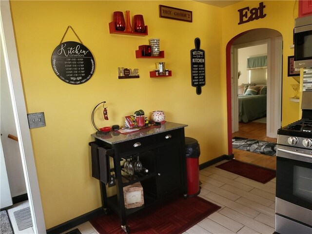 313 Gardner Rd, Horseheads, NY 14845 - hallway with arched walkways and light wood-type flooring