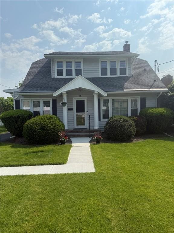 16 Cobbles E, Elmira, NY 14905 - view of front of property with a chimney, a front lawn, and a shingled roof