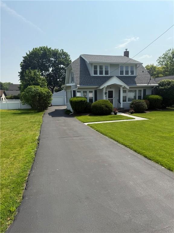 16 Cobbles E, Elmira, NY 14905 - dutch colonial with a chimney and a garage