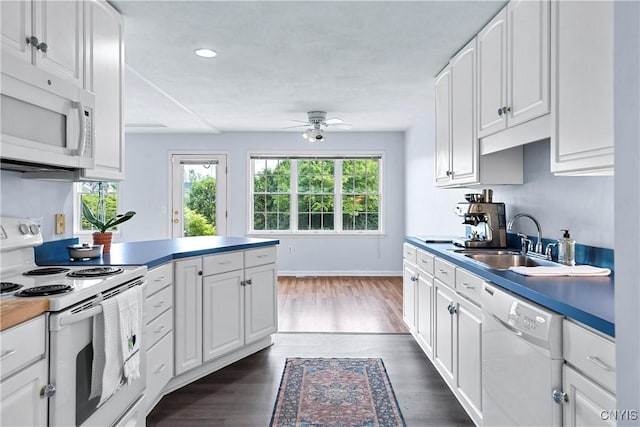 1 Wicklow Dr, Skaneateles, NY 13152 - kitchen with white appliances, a sink, a ceiling fan, white cabinetry, and dark wood-style flooring