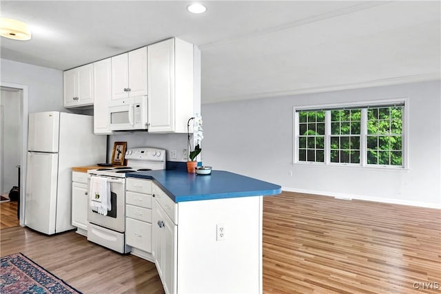 1 Wicklow Dr, Skaneateles, NY 13152 - kitchen featuring white appliances, light wood finished floors, white cabinets, dark countertops, and baseboards