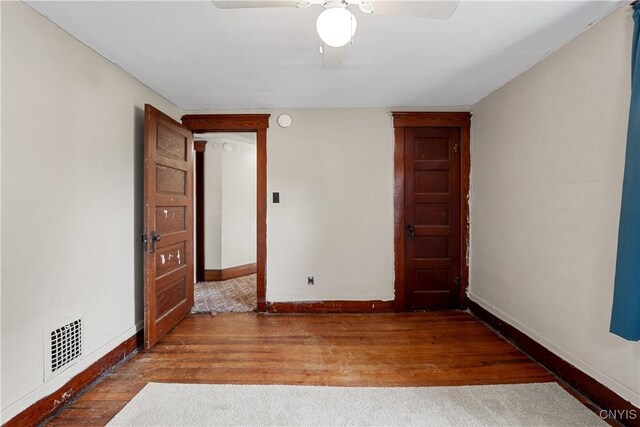 172 Nichols Ave, Syracuse, NY 13206 - spare room featuring baseboards, wood finished floors, and a ceiling fan