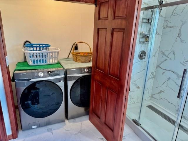 251 Pearsall Rd, Westford, NY 12155 - laundry area with washing machine and clothes dryer and light marble finish flooring