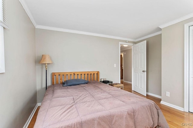 4190 Stepping Stone Ln, Clay, NY 13090 - bedroom featuring wood finished floors, ornamental molding, and baseboards