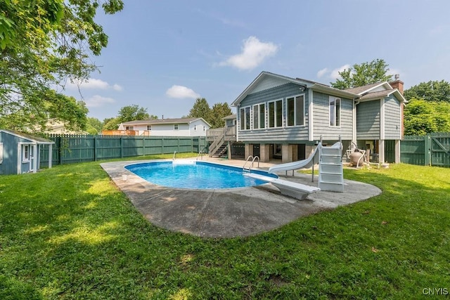 4190 Stepping Stone Ln, Clay, NY 13090 - rear view of property featuring stairs, a deck, a chimney, and a patio