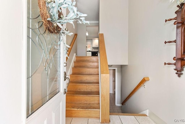 4190 Stepping Stone Ln, Clay, NY 13090 - stairway featuring tile patterned floors and baseboards