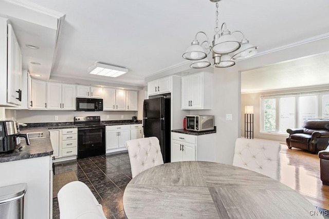 4190 Stepping Stone Ln, Clay, NY 13090 - kitchen featuring black appliances, dark countertops, a sink, crown molding, and a chandelier