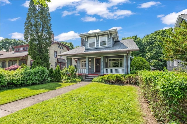 1579 Culver Rd, Rochester, NY 14609 - view of front of home with covered porch and a front yard