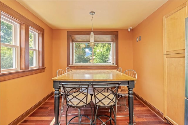 1579 Culver Rd, Rochester, NY 14609 - dining space with dark wood-type flooring and baseboards