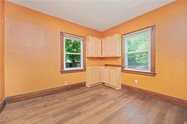 1579 Culver Rd, Rochester, NY 14609 - unfurnished room featuring baseboards and light wood-style flooring