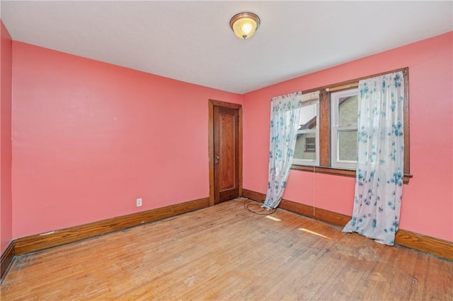 1579 Culver Rd, Rochester, NY 14609 - unfurnished room with light wood finished floors and baseboards
