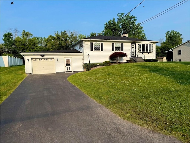 2988 E Ave, Waterloo, NY 13165 - view of front of home with an attached garage, entry steps, driveway, and a chimney