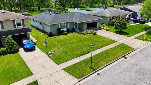 21 Kathy Ln, West Seneca, NY 14224 - single story home featuring concrete driveway, roof with shingles, a garage, and a front yard