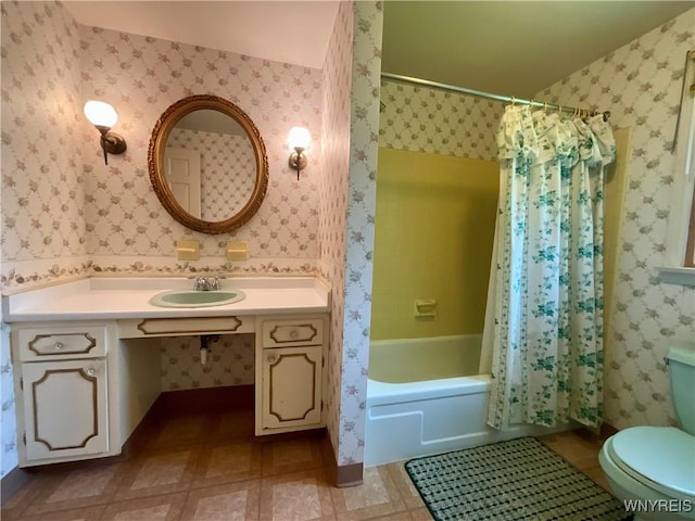 21 Kathy Ln, West Seneca, NY 14224 - bathroom featuring toilet, shower / tub combo with curtain, vanity, and wallpapered walls
