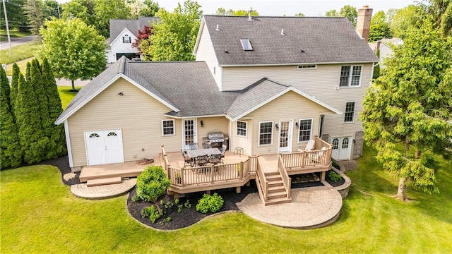 2 Princeton Ln, Perinton, NY 14450 - back of property featuring a chimney, a deck, a yard, and a shingled roof
