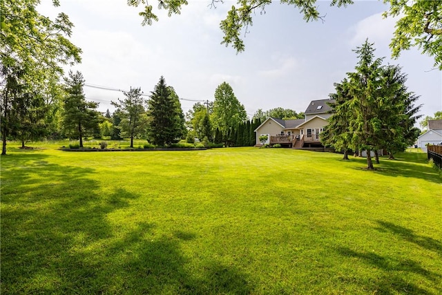 2 Princeton Ln, Perinton, NY 14450 - view of grassy yard with a deck
