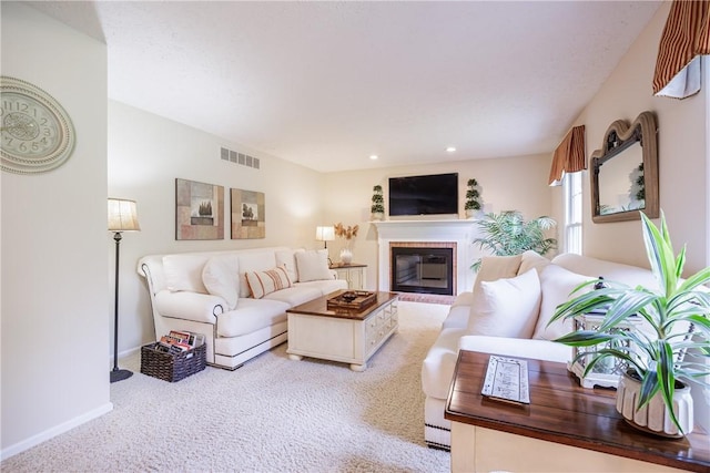 2 Princeton Ln, Perinton, NY 14450 - living area featuring light carpet, a glass covered fireplace, baseboards, and recessed lighting