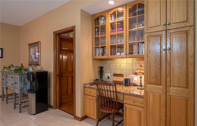 256 Queen Esther Dr, Sayre, PA 18840 - home office with built in study area, light tile patterned floors, and baseboards