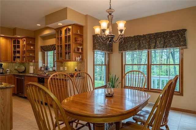 256 Queen Esther Dr, Sayre, PA 18840 - dining area with light tile patterned floors, healthy amount of natural light, a chandelier, recessed lighting, and baseboards