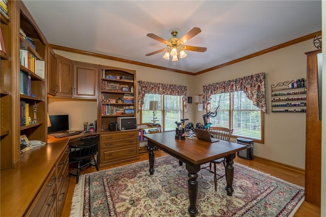 256 Queen Esther Dr, Sayre, PA 18840 - home office featuring ceiling fan, light wood-type flooring, crown molding, and built in desk
