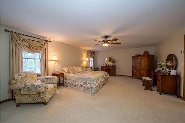 256 Queen Esther Dr, Sayre, PA 18840 - bedroom with light colored carpet, a ceiling fan, and baseboards