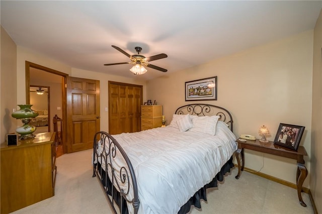 256 Queen Esther Dr, Sayre, PA 18840 - bedroom featuring light colored carpet, a closet, and ceiling fan