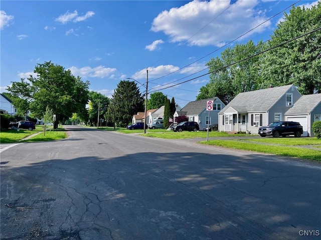 226 Darlington Rd, Syracuse, NY 13208 - view of asphalt street with a residential view and traffic signs
