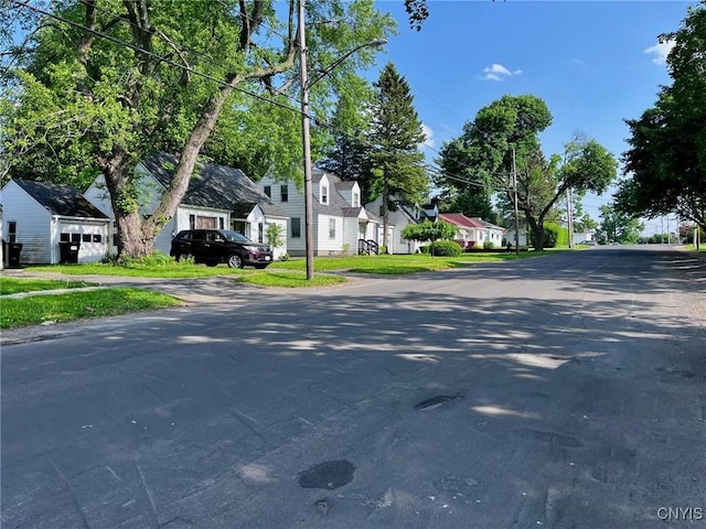 226 Darlington Rd, Syracuse, NY 13208 - view of asphalt street with a residential view