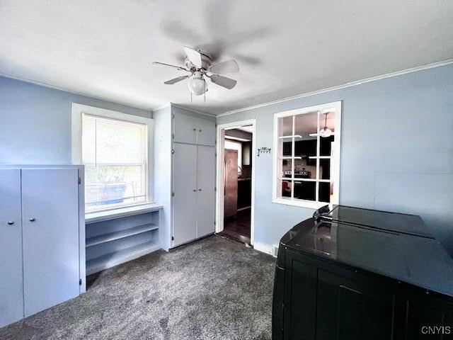 226 Darlington Rd, Syracuse, NY 13208 - bedroom with dark colored carpet, crown molding, and a ceiling fan
