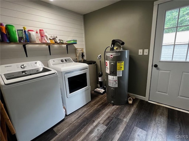 8 Office Rd, Fowler, NY 13642 - washroom with electric water heater, washing machine and clothes dryer, dark wood-type flooring, and wood walls