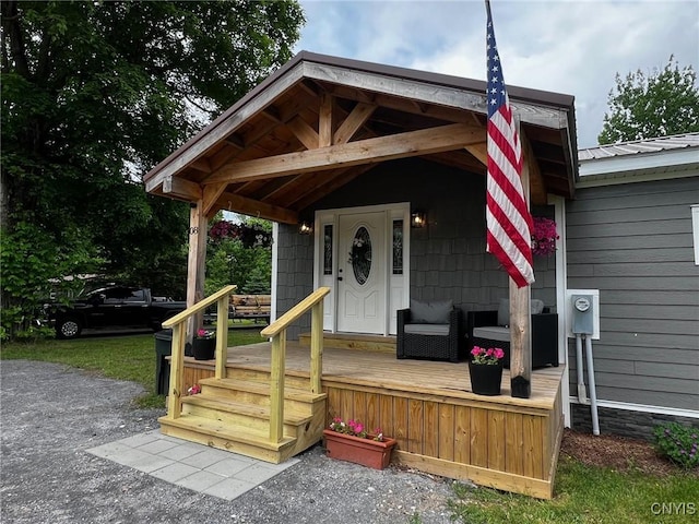 8 Office Rd, Fowler, NY 13642 - property entrance featuring metal roof and a wooden deck