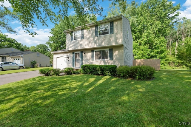 4287 Stepping Stone Ln, Clay, NY 13090 - colonial home with an attached garage, driveway, and a front yard