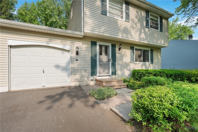 4287 Stepping Stone Ln, Clay, NY 13090 - view of front of house with a garage and driveway