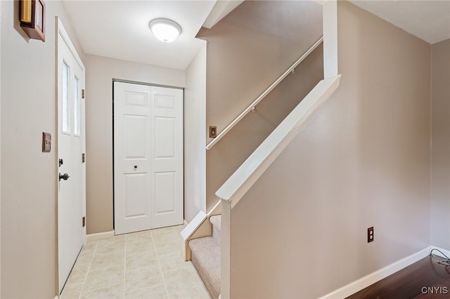 4287 Stepping Stone Ln, Clay, NY 13090 - foyer with stairway, baseboards, and light tile patterned flooring