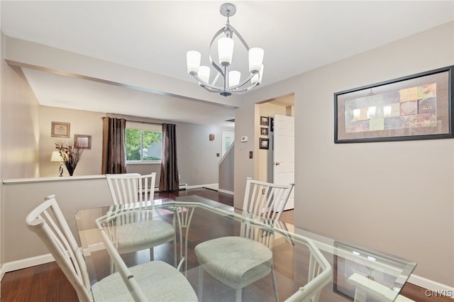 4287 Stepping Stone Ln, Clay, NY 13090 - dining room with baseboards, a chandelier, and wood finished floors