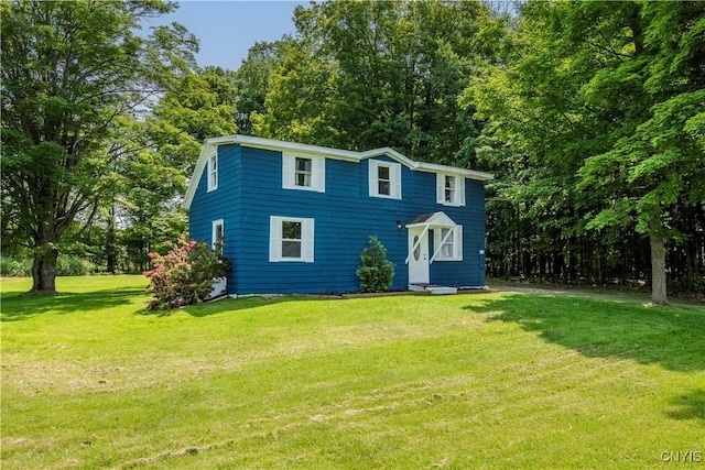 3838 Dawes Ave, Kirkland, NY 13323 - view of front facade featuring a front lawn and view of scattered trees