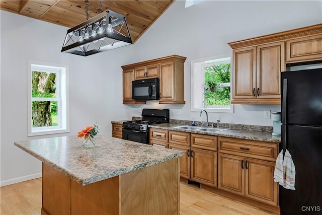 3838 Dawes Ave, Kirkland, NY 13323 - kitchen with black appliances, a sink, wooden ceiling, light wood finished floors, and a center island
