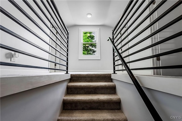 3838 Dawes Ave, Kirkland, NY 13323 - staircase featuring vaulted ceiling and baseboards