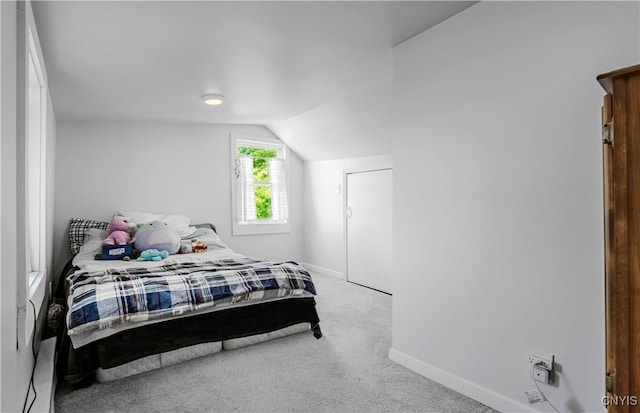 3838 Dawes Ave, Kirkland, NY 13323 - bedroom with lofted ceiling, baseboards, and carpet floors