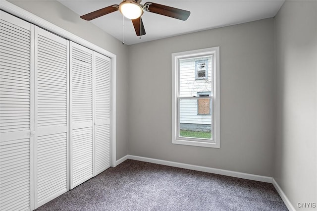 308 Lewis St, Syracuse, NY 13204 - unfurnished bedroom with a closet, carpet floors, baseboards, and a ceiling fan