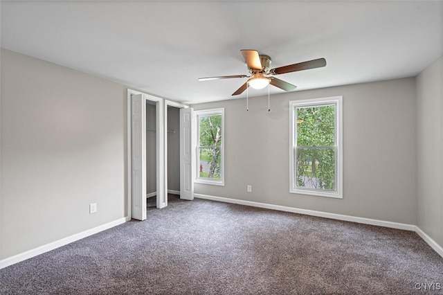 308 Lewis St, Syracuse, NY 13204 - empty room with healthy amount of natural light, ceiling fan, and carpet floors