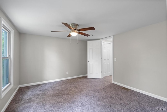 308 Lewis St, Syracuse, NY 13204 - spare room featuring carpet flooring, a ceiling fan, and baseboards