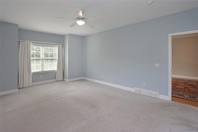207 Falling Brook Path, Manlius, NY 13066 - spare room with a ceiling fan, carpet, baseboards, and a smoke detector