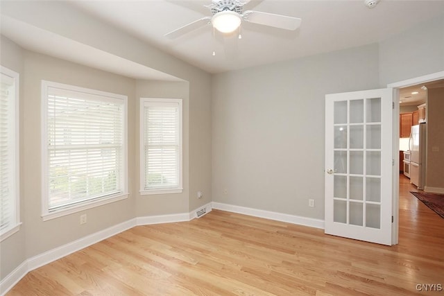 207 Falling Brook Path, Manlius, NY 13066 - unfurnished room with light wood-style flooring, a ceiling fan, baseboards, and a smoke detector